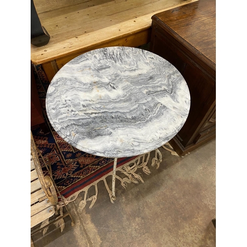 1090 - A painted wrought iron and reconstituted marble circular garden table, diameter 65cm, height 72cm... 