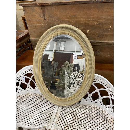 1093 - A modern oval painted Victorian style wall mirror, width 67cm, height 87cm