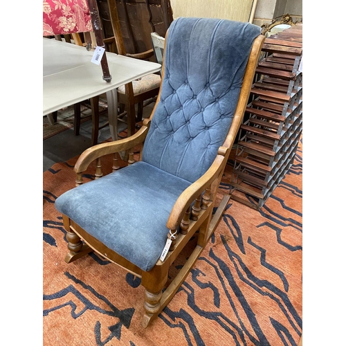 1100 - A Victorian upholstered mahogany rocking chair, height 96cm