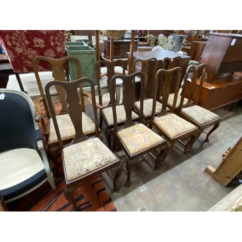 1104 - A set of eight early 20th century Queen Anne style mahogany dining chairs, one with arms