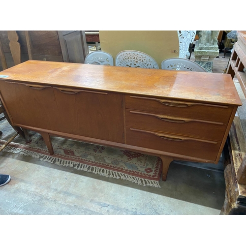 1106 - A mid century teak sideboard, length 168cm, depth 45cm, height 74cm