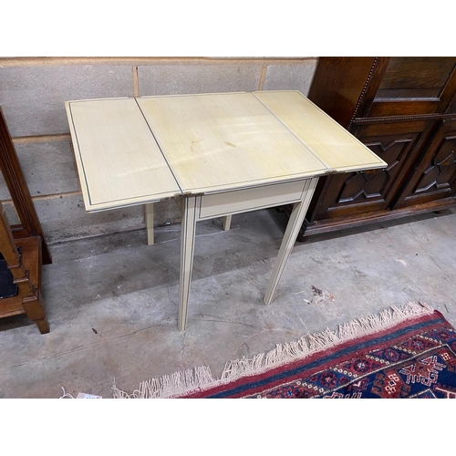 1132 - A painted side table with hinged twin flap top, width 39cm, depth 50cm, height 63cm