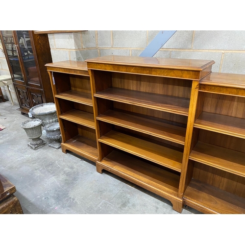 1138 - A mahogany open dwarf breakfront bookcase, width 213cm, depth 33cm, height 115cm