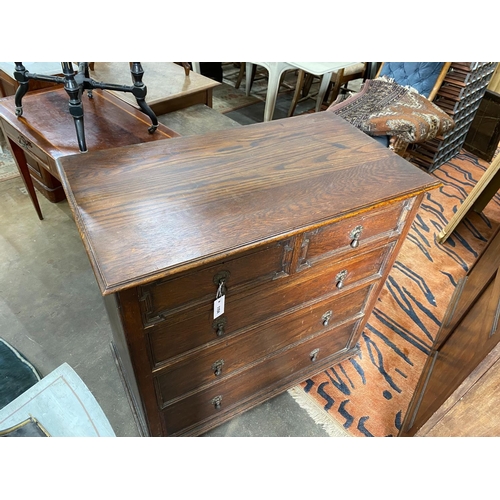 1154 - A 1920's Jacobean revival oak chest, width 99cm, depth 54cm, height 96cm