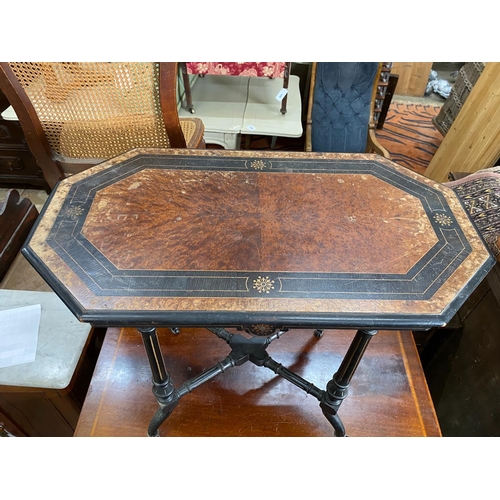 1155 - A late Victorian ebonised amboyna octagonal centre table, width 81cm, depth 46cm, height 69cm