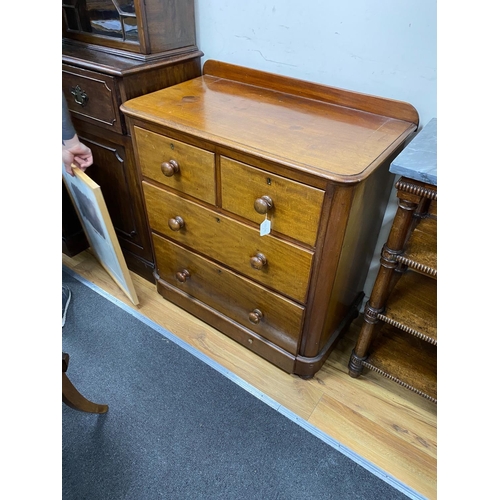 1161 - A small Victorian satinwood and mahogany chest of two short and two long drawers, width 89cm, depth ... 