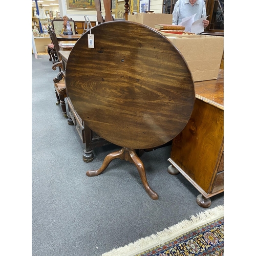 1181 - A George III and later circular mahogany tilt top tea table with birdcage alignment, diameter 86cm, ... 