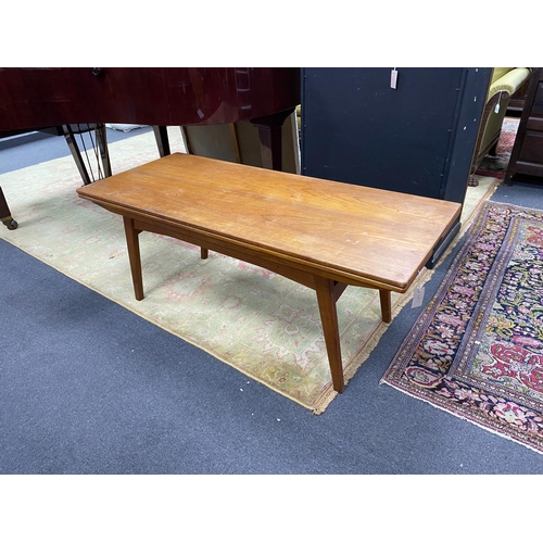 1190 - A Danish rectangular teak metamorphic coffee / dining table by Niels Bach, smallest dimensions width... 