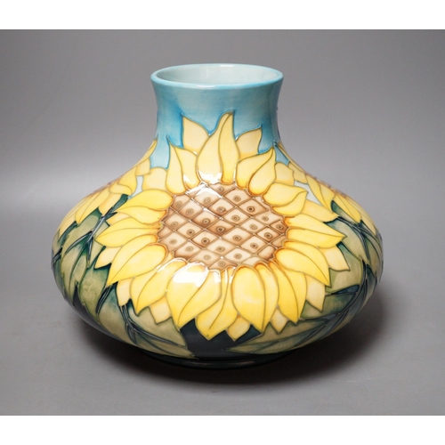 1252 - A Moorcroft pottery vase of compressed form, decorated in the "Sunflower" pattern, 20cm... 