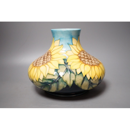 1252 - A Moorcroft pottery vase of compressed form, decorated in the "Sunflower" pattern, 20cm... 