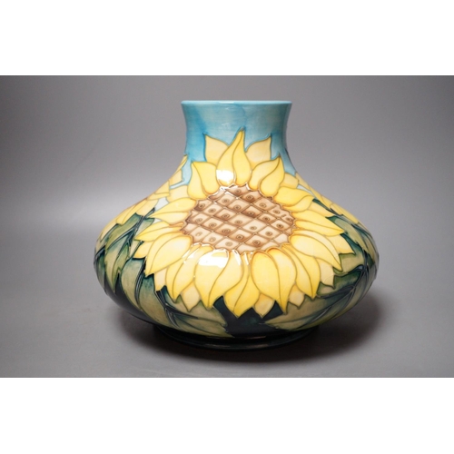 1252 - A Moorcroft pottery vase of compressed form, decorated in the "Sunflower" pattern, 20cm... 