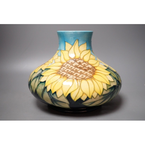 1252 - A Moorcroft pottery vase of compressed form, decorated in the "Sunflower" pattern, 20cm... 