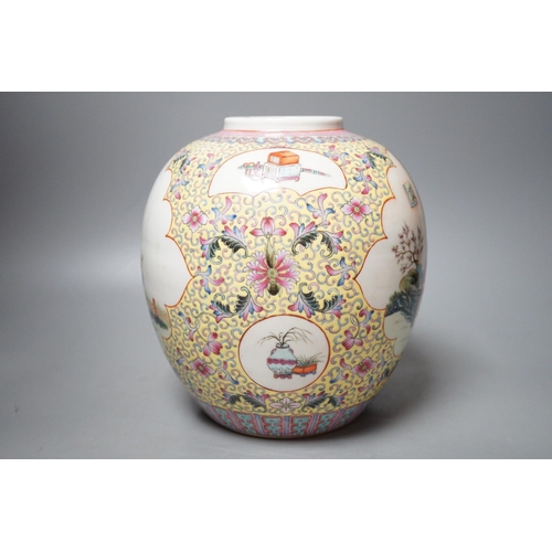 1256 - A Chinese yellow ground famille rose jar, Republic Period, 22cm