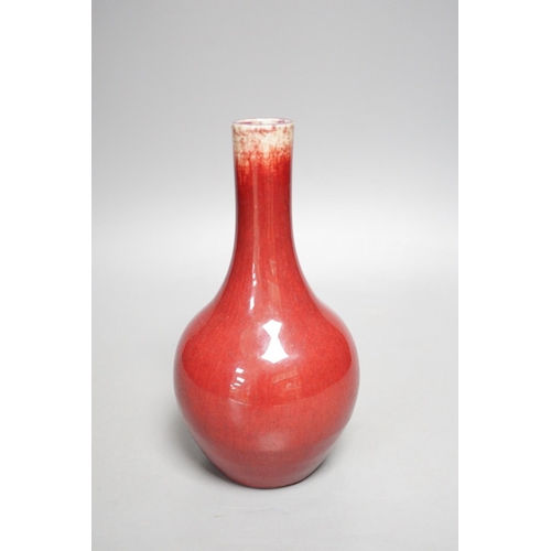 1260 - An 18th century Chinese Langyao sang-de-boeuf glazed bottle vase, 20cm