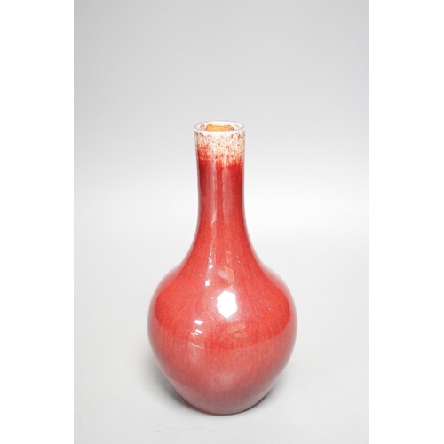 1260 - An 18th century Chinese Langyao sang-de-boeuf glazed bottle vase, 20cm