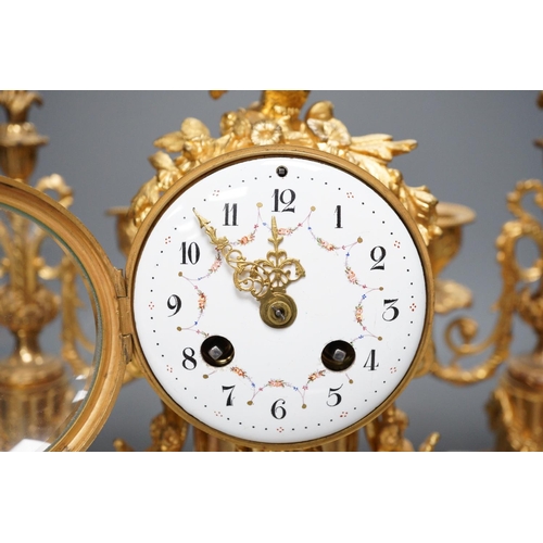 1274 - A French ormolu and alabaster clock garniture, 27cm