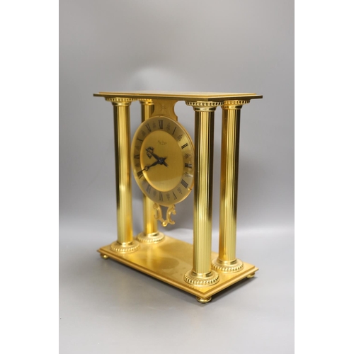 1279 - A contemporary Hour Lavigne gilt metal cased quartz mantel clock