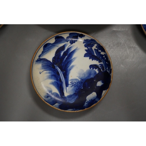 1280 - Three Japanese Arita dishes and a Chinese dragon plate, largest 23cm diameter