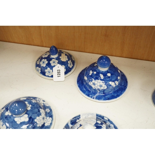 1283 - Twelve 18th/19th century Chinese blue and white prunus vase and jar covers, largest 17 cm diameter... 