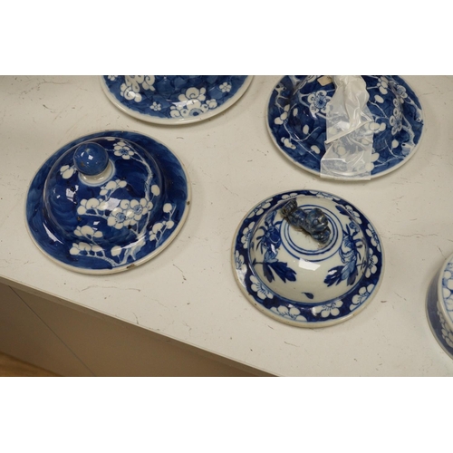 1283 - Twelve 18th/19th century Chinese blue and white prunus vase and jar covers, largest 17 cm diameter... 