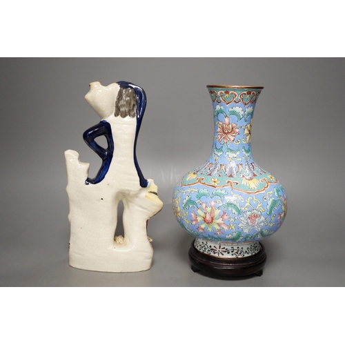 1284 - A Chinese canton enamel vase, wood stand, 23.5cm tall