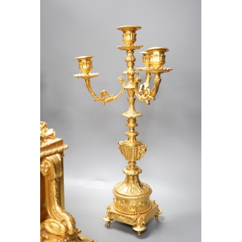 1289 - A Louis XVI style ormolu cherub clock garniture, late 19th century, with pendulum, 43cm tall... 