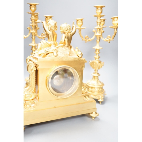 1289 - A Louis XVI style ormolu cherub clock garniture, late 19th century, with pendulum, 43cm tall... 