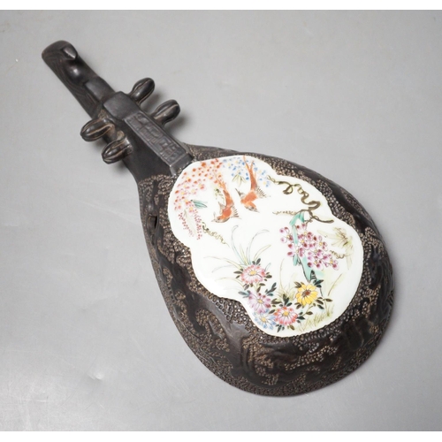 1292 - A Chinese wall model of a musical string instrument (Pipa?) with painted porcelain inset, 27cm long... 