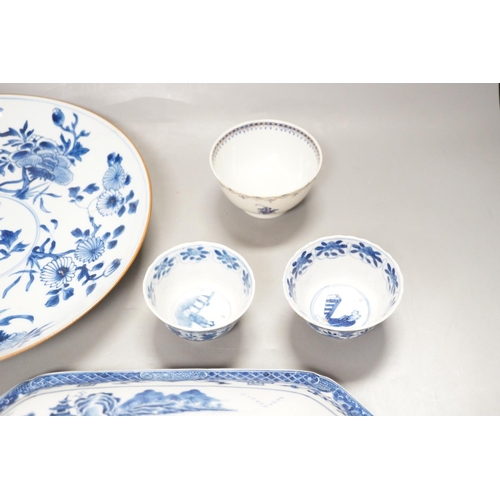 1293 - An 18th century Chinese blue and white dish, 29cm diameter, a similar lid and three tea bowls