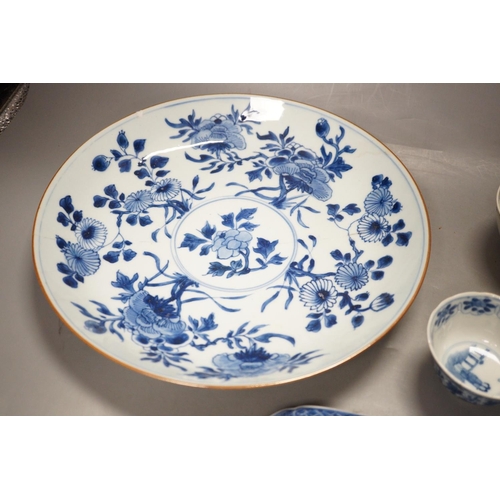 1293 - An 18th century Chinese blue and white dish, 29cm diameter, a similar lid and three tea bowls