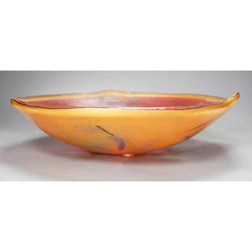 1294 - A large red French Studio glass dish, 40cm diameter