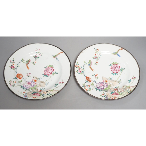 1299 - A pair of Chinese Qianlong famille rose plates, damage , 23cm diameter