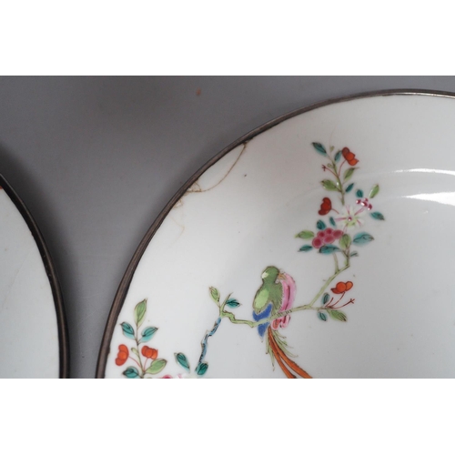 1299 - A pair of Chinese Qianlong famille rose plates, damage , 23cm diameter