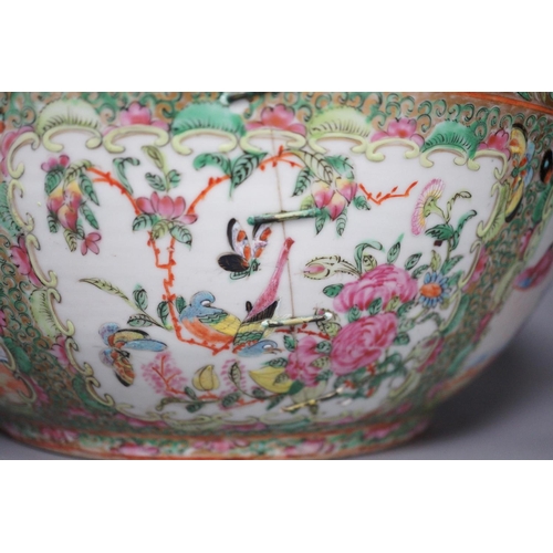 1300 - A 19th century Chinese famille rose punch bowl, painted with figures, 34.5 cm diameter, repaired... 