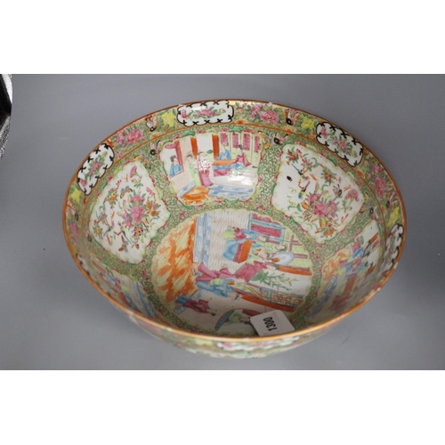 1300 - A 19th century Chinese famille rose punch bowl, painted with figures, 34.5 cm diameter, repaired... 