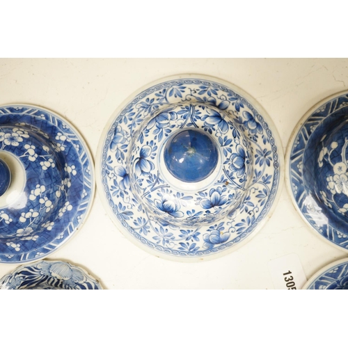 1305 - Six Chinese Kangxi blue and white vases and jar covers, largest 21.5cm diameter.Provenance - D.C.Mon... 