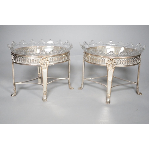 1308 - A pair of silver plated & cut glass sweetmeat dishes on stands,13 cms high,