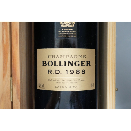 1310 - A bottle of Bollinger R.D. 1988, 75cl in original wood case