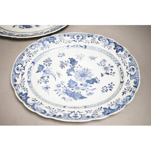 1311 - A pair of Chinese blue and white platters, decorated flowers, late 18th century, 34.5cm