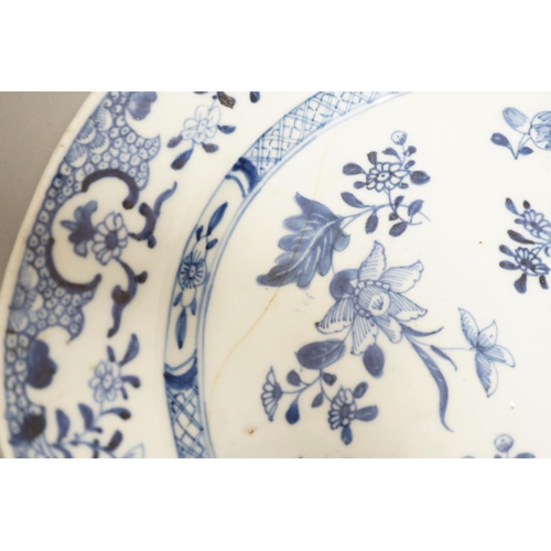 1311 - A pair of Chinese blue and white platters, decorated flowers, late 18th century, 34.5cm