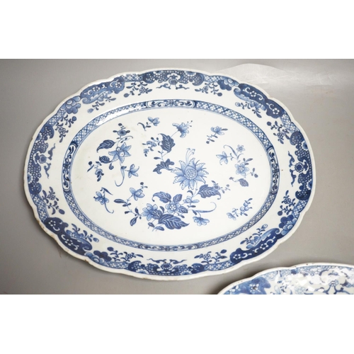 1311 - A pair of Chinese blue and white platters, decorated flowers, late 18th century, 34.5cm