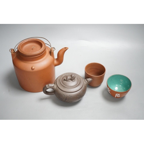 1315 - Two Chinese Yixing teapots and two similar teabowls. Tallest 14cm