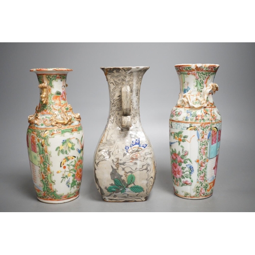 1317 - Two 19th century Chinese famille rose vases and an enamelled marbled vase, 20cm