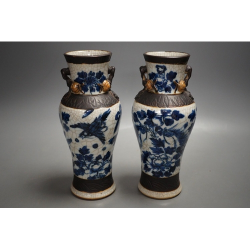 1327 - A pair of late 19th century Chinese blue and white crackle glaze vases, 21cm