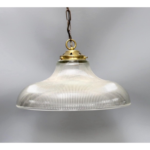 1331 - A clear ribbed glass shaded and brass pendant light,shade 37.5 cms diameter.