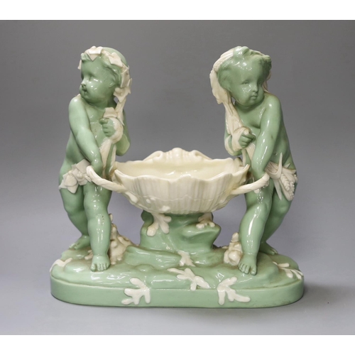 1335 - A Minton glazed celadon tinted parian centrepiece, mid 19th century, after Carrier-Belleuse,26cms hi... 