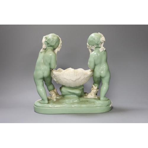 1335 - A Minton glazed celadon tinted parian centrepiece, mid 19th century, after Carrier-Belleuse,26cms hi... 