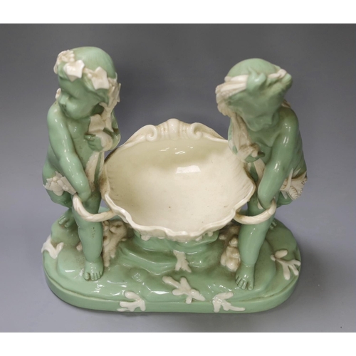 1335 - A Minton glazed celadon tinted parian centrepiece, mid 19th century, after Carrier-Belleuse,26cms hi... 