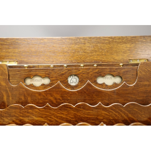 1340 - An Edwardian oak two door stationary box,36 cms high,