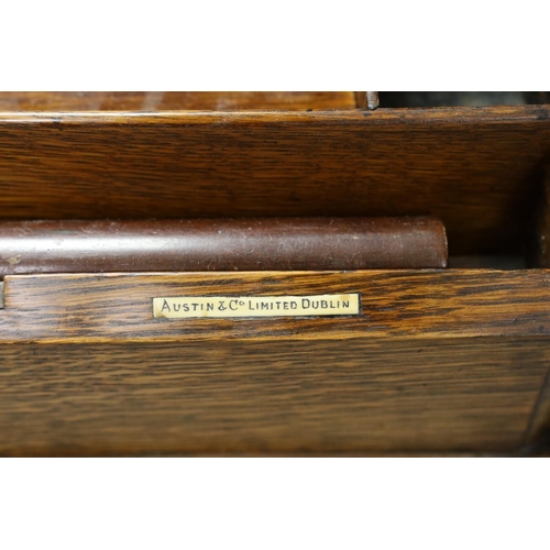 1340 - An Edwardian oak two door stationary box,36 cms high,